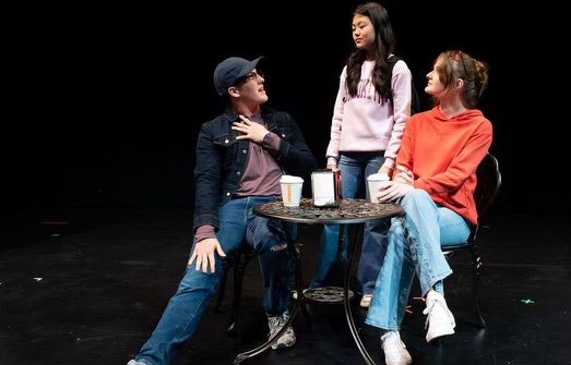 Junior Maureen Min and Seniors Charlie Schmidt and Lana Tosic perform onstage Senior Sanjna Pandit's One Act "Where America Runs"